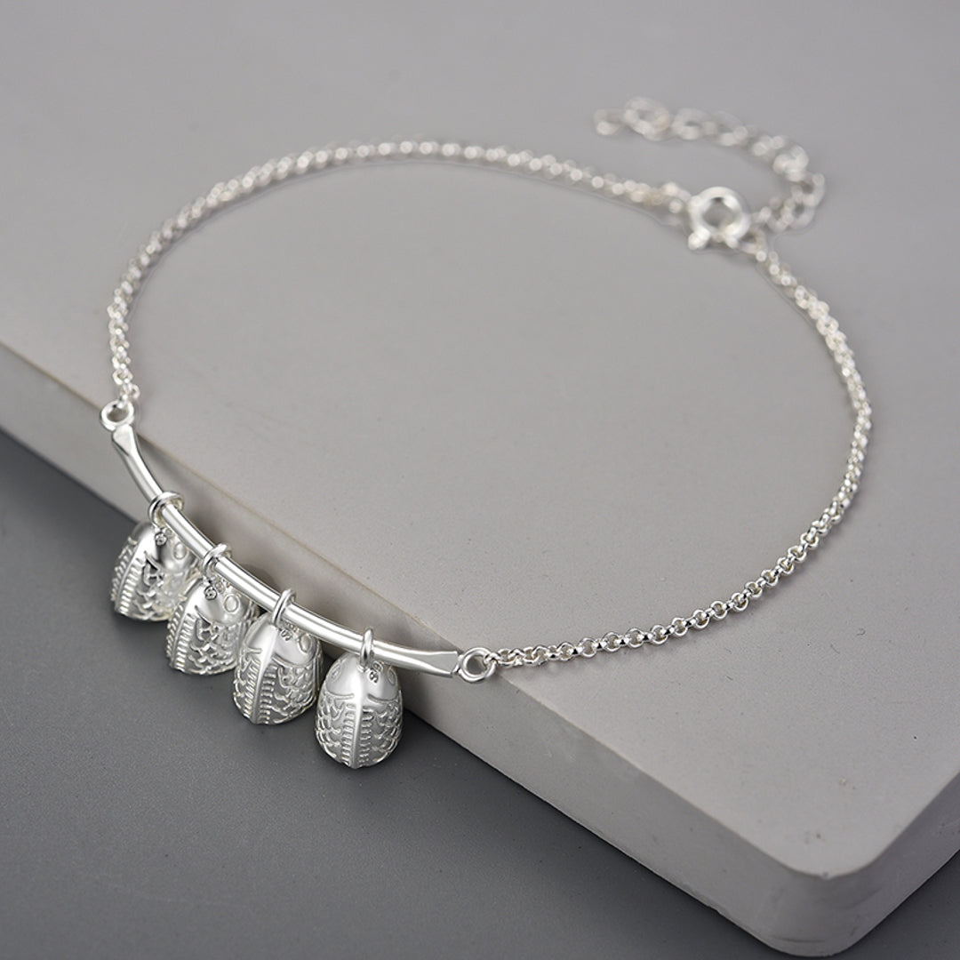 Bracelet-With-Engraved-Bells-By-Yonandole_3