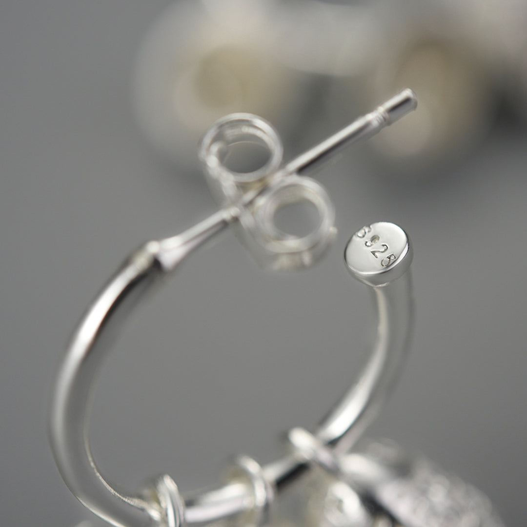 Earrings-With-Engraved-Bells-By-Yonandole_5