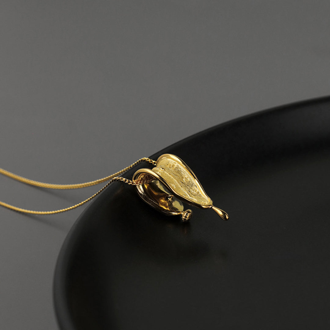 Melting-Clock-Pendant-By-Yonandole_1