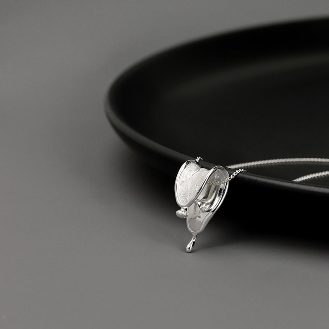 Melting-Clock-Pendant-By-Yonandole_11