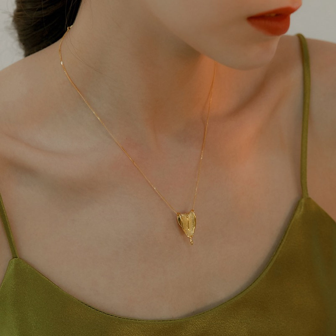 Melting-Clock-Pendant-By-Yonandole_3