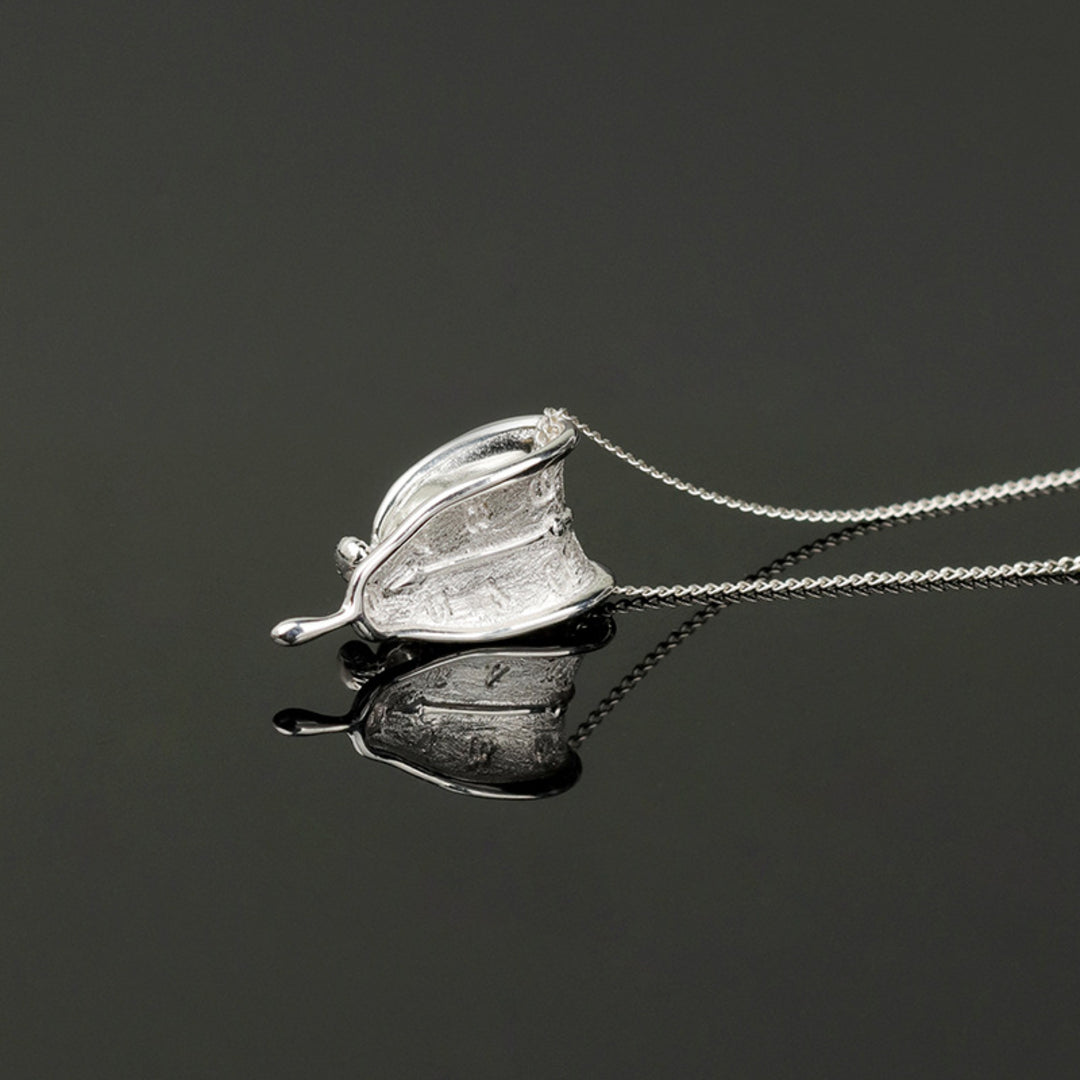 Melting-Clock-Pendant-By-Yonandole_8