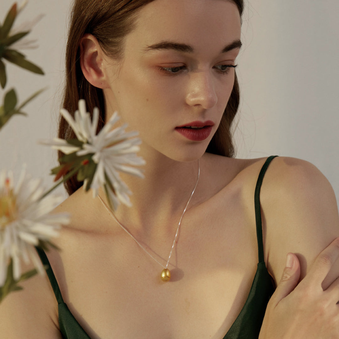 Necklace-With-Surprise-Egg-Pendant-By-Yonandole_11