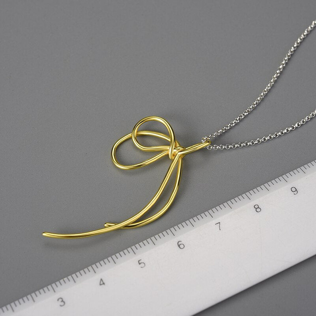 Necklace-With-Thread-And-Loose-Knot-Pendant-By-Yonandole_7