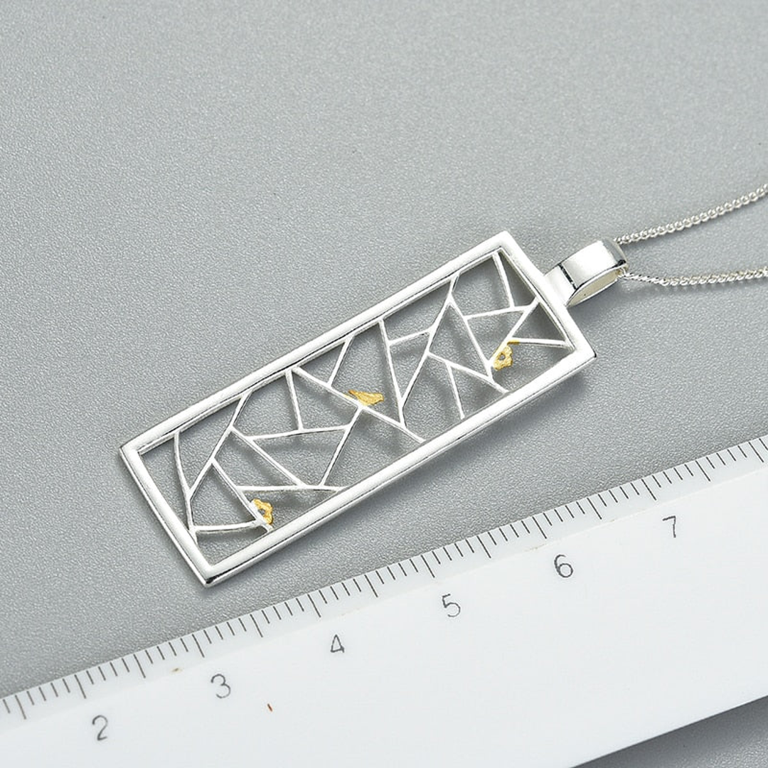 Pendant-With-A-Grid-And-A-Small-Bird-By-Yonandole_4