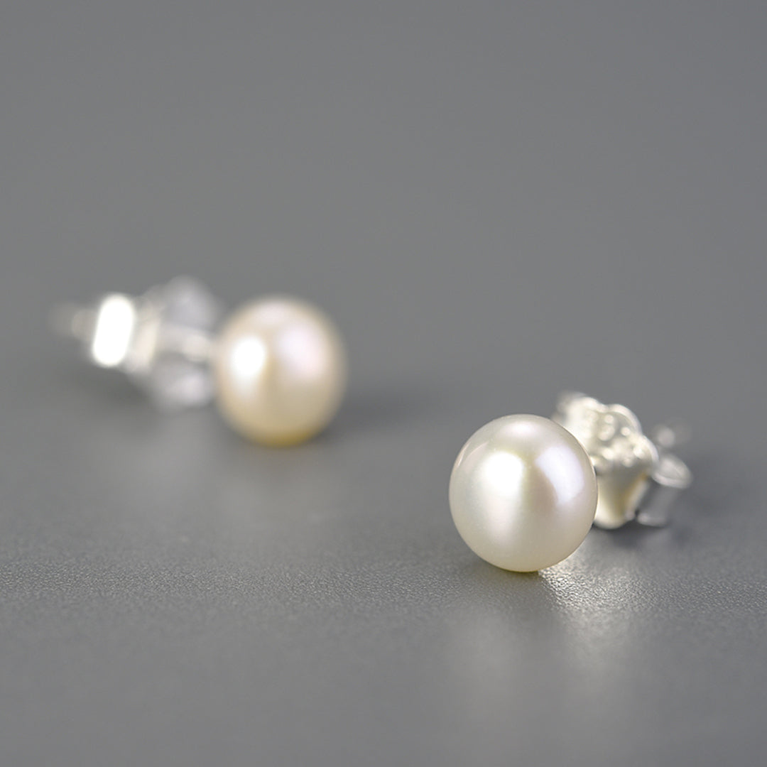 Stud-Earrings-With-A-Small-Freshwater-Pearl-By-Yonandole_1