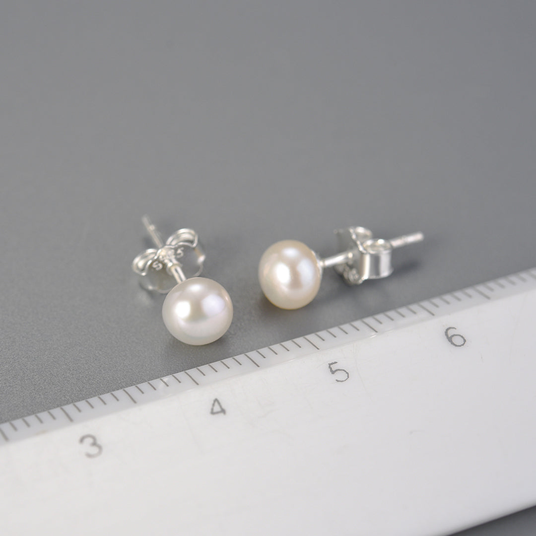 Stud-Earrings-With-A-Small-Freshwater-Pearl-By-Yonandole_2
