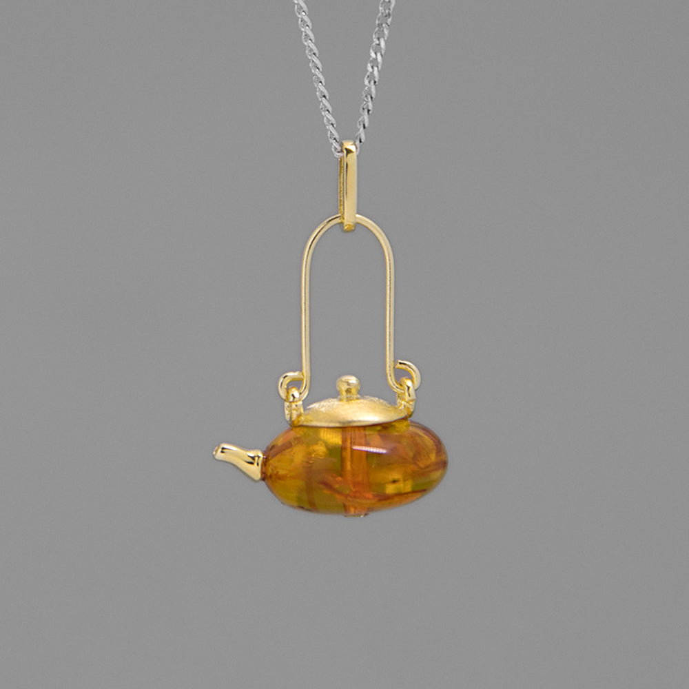 
                  
                    Amber-Teapot-Pendant-By-Yonandole_1
                  
                