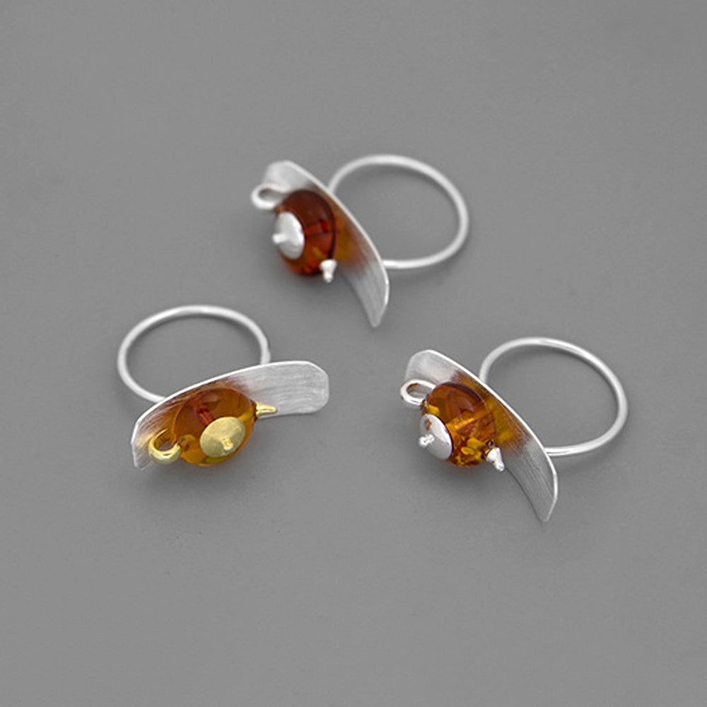 
                      
                        Amber-Teapot-Ring-By-Yonandole_7
                      
                    