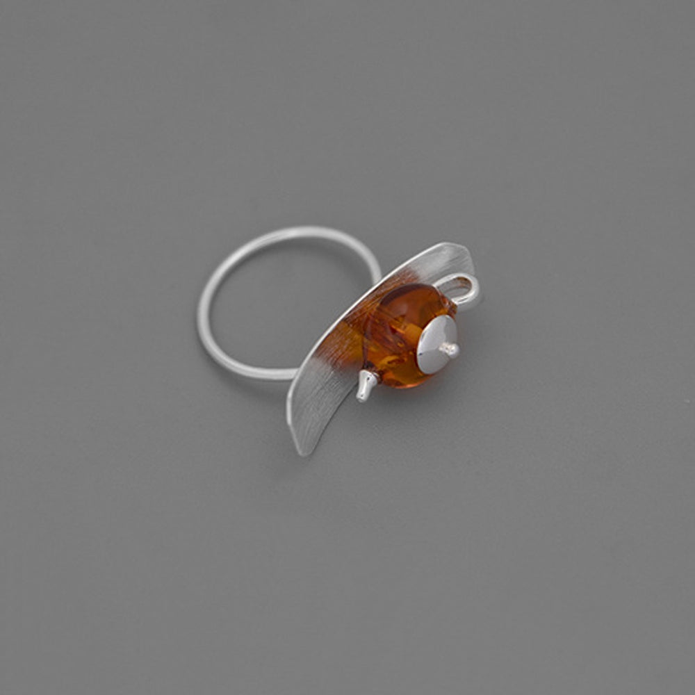 
                      
                        Amber-Teapot-Ring-By-Yonandole_8
                      
                    