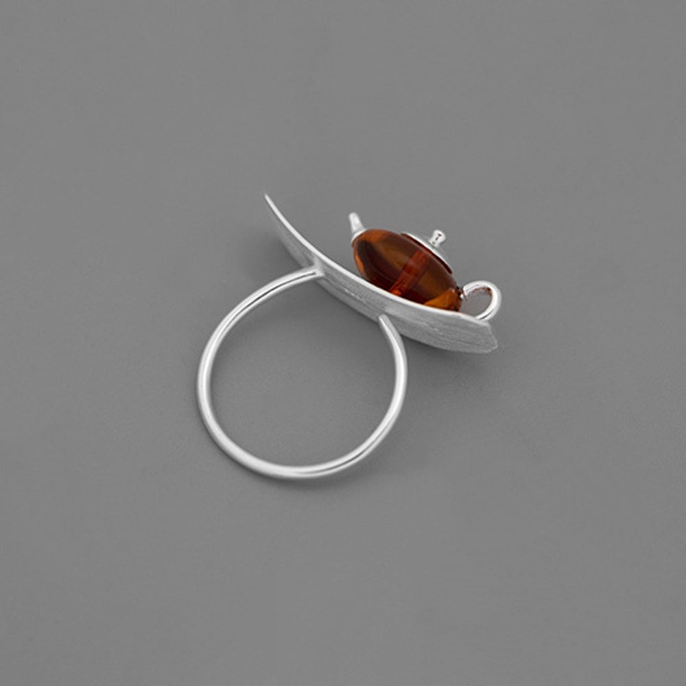 
                      
                        Amber-Teapot-Ring-By-Yonandole_9
                      
                    