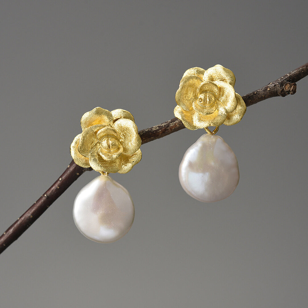 
                  
                    Camellia-Earrings-With-Baroque-Pearl-By-Yonandole_1
                  
                