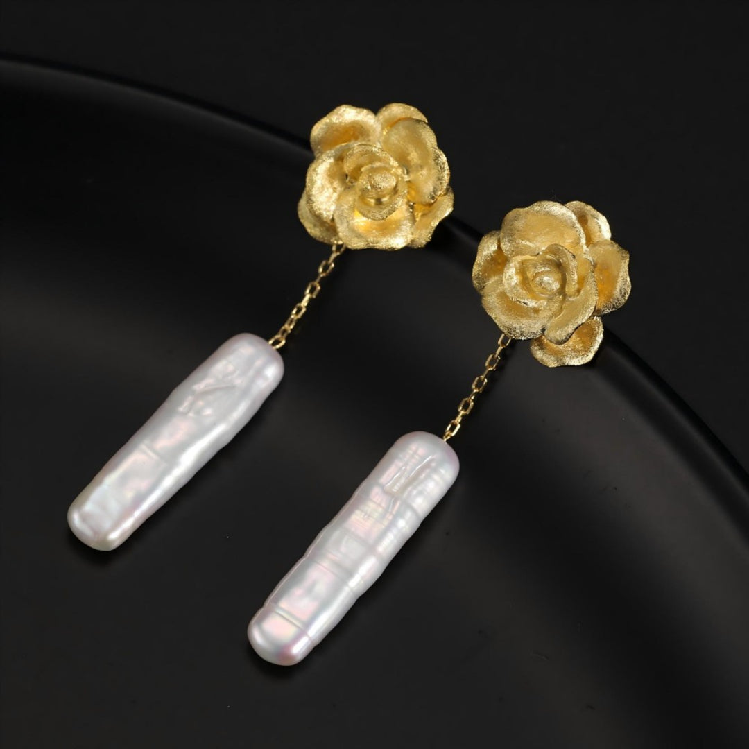 Camellia-Earrings-With-Elongated-White-Baroque-Pearls-By-Yonandole_6