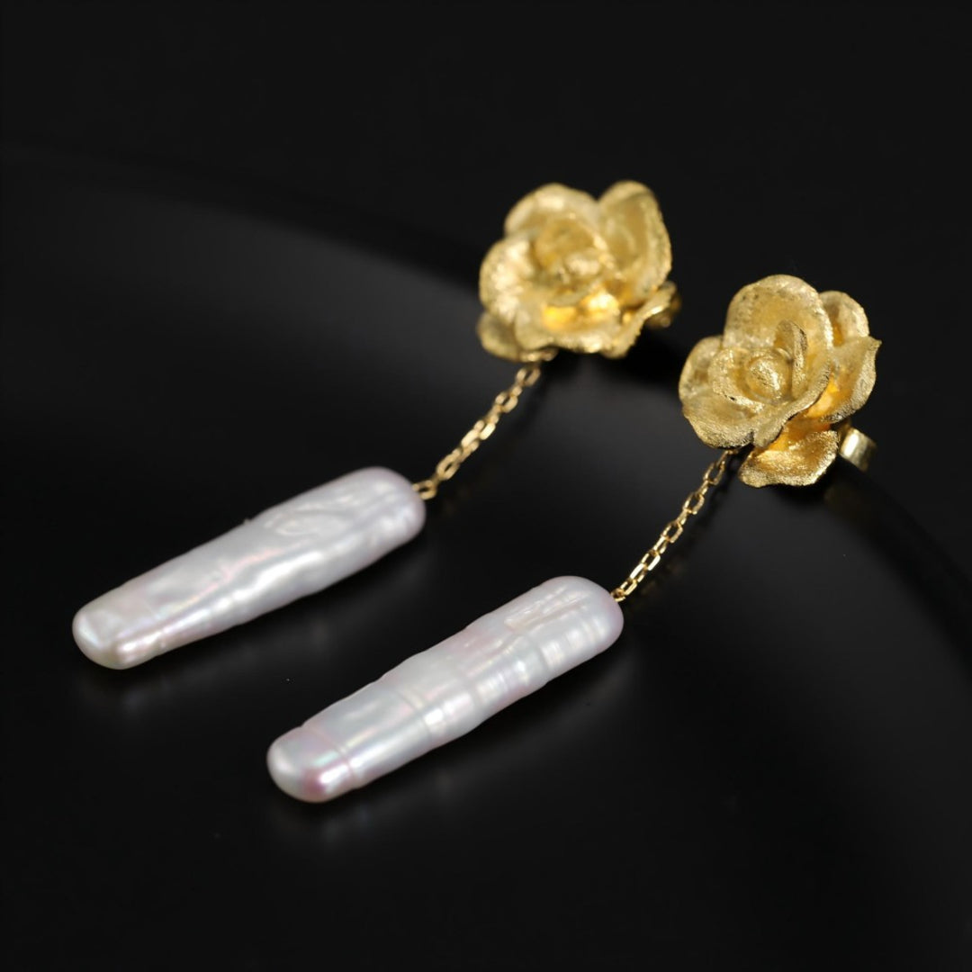 Camellia-Earrings-With-Elongated-White-Baroque-Pearls-By-Yonandole_7