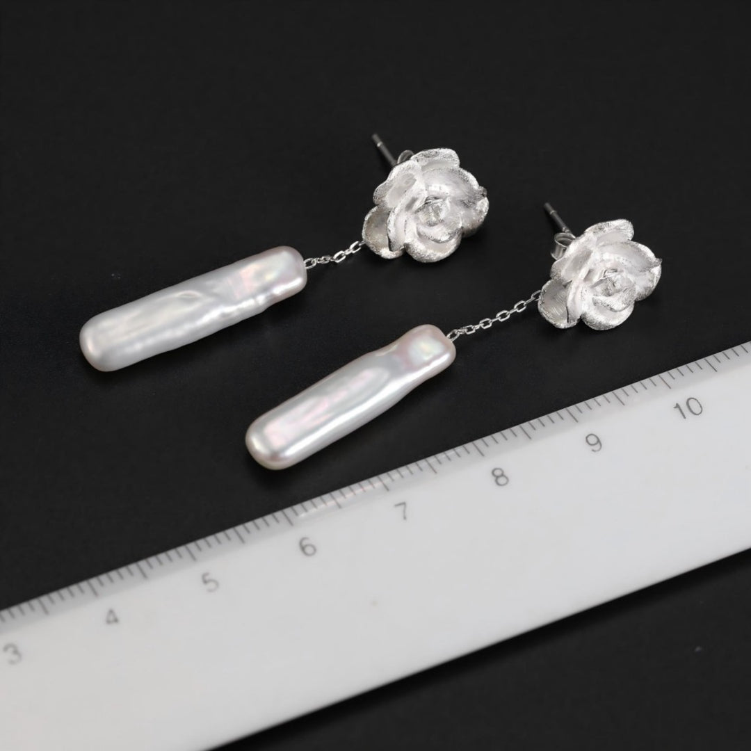 Camellia-Earrings-With-Elongated-White-Baroque-Pearls-By-Yonandole_8