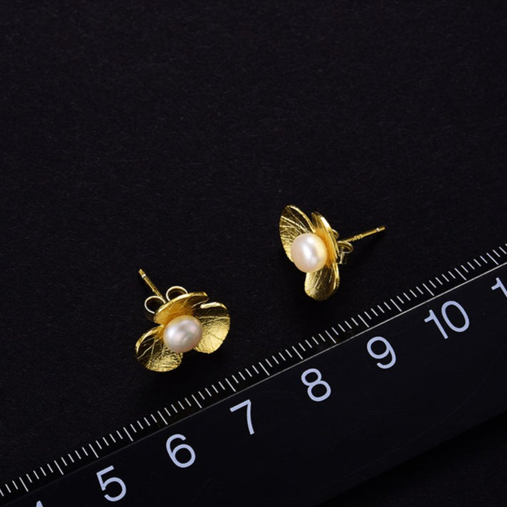 
                  
                    Clover-Earrings-With-Freshwater-Pearl-By-Yonandole_13
                  
                