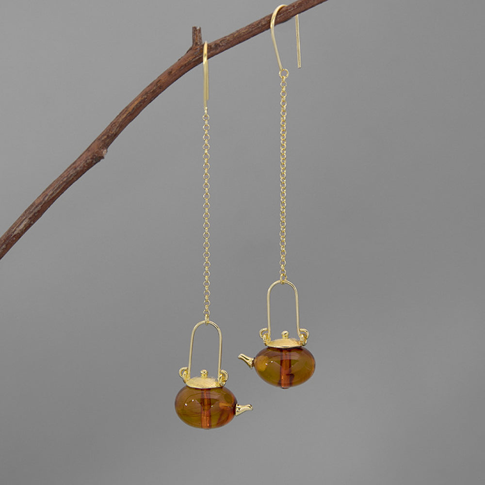 
                  
                    Dangle-Earrings-With-Amber-Teapot-By-Yonandole_2
                  
                