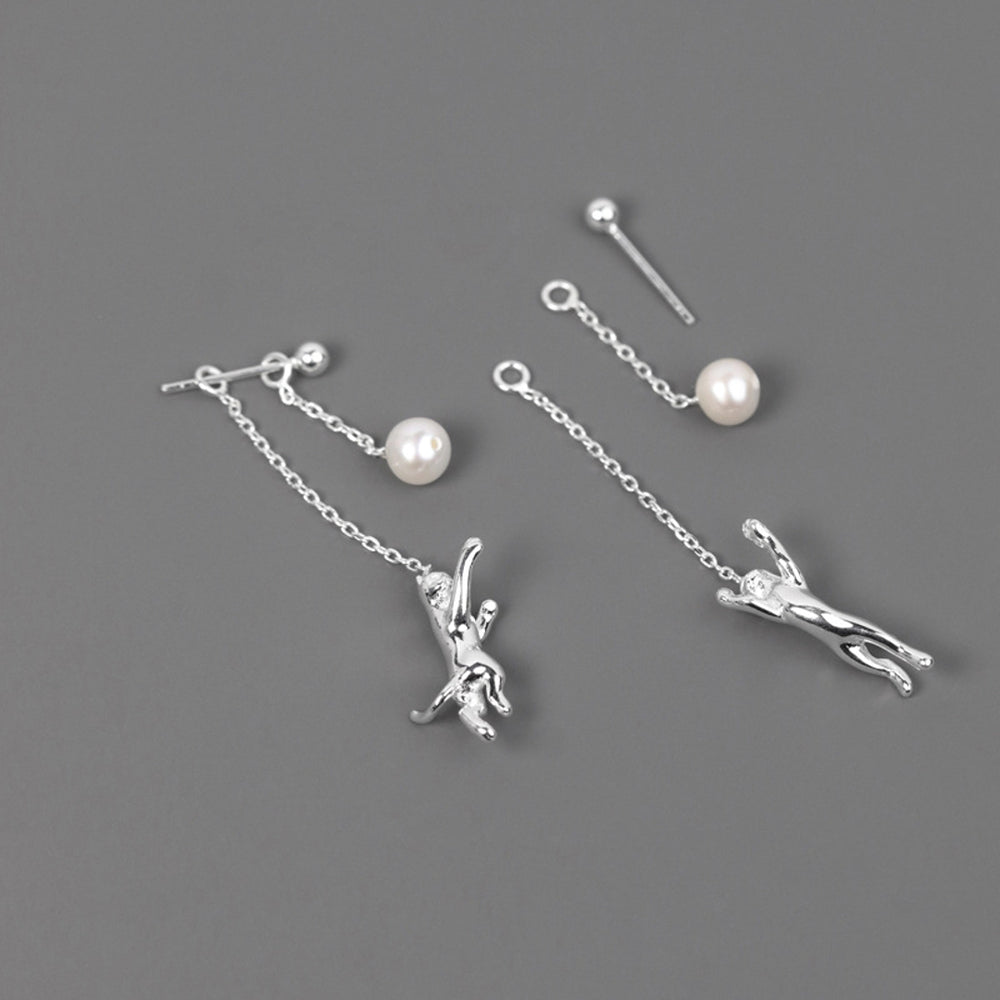 
                      
                        Dangle-Earrings-With-Cat-And-Pearl_10
                      
                    