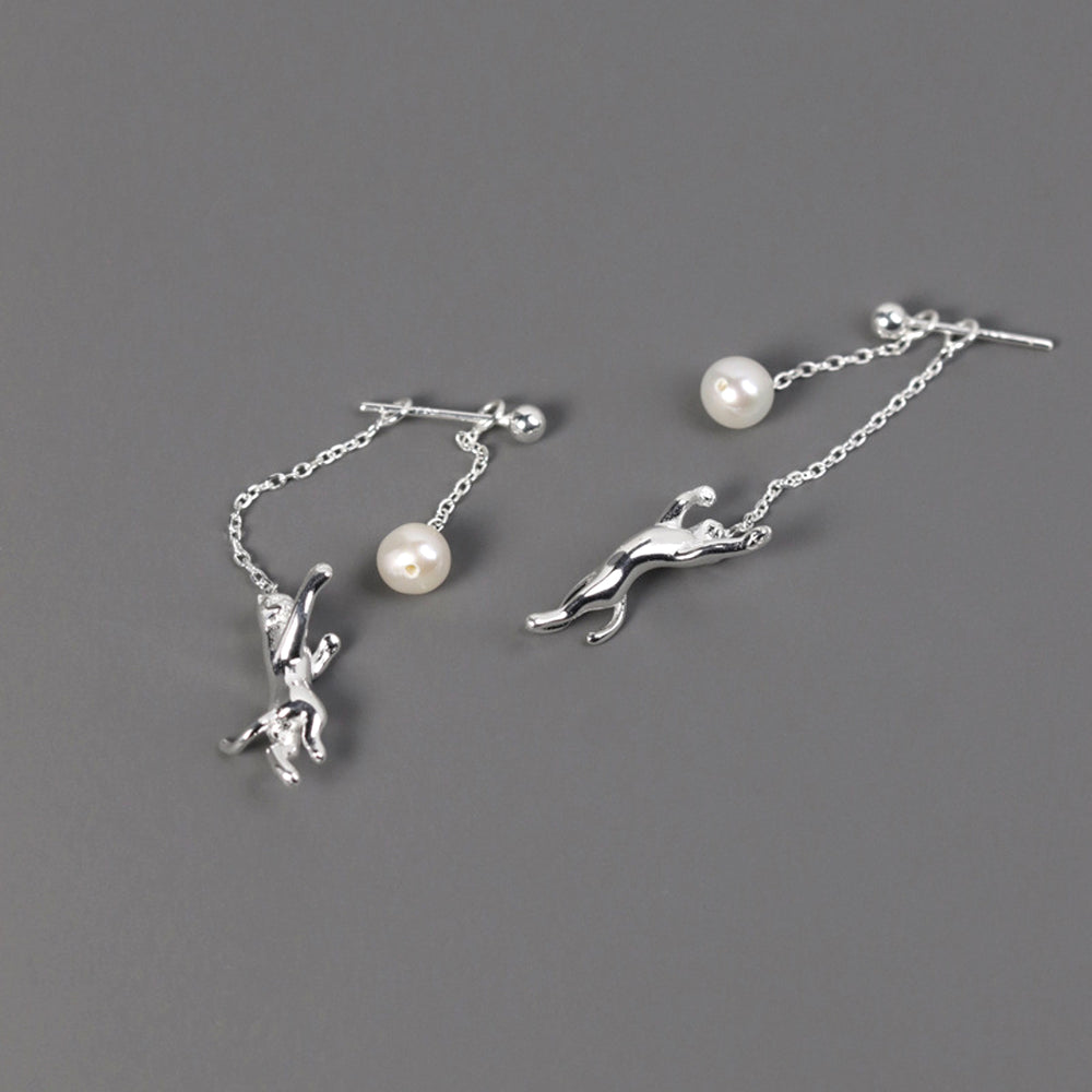 
                      
                        Dangle-Earrings-With-Cat-And-Pearl_11
                      
                    