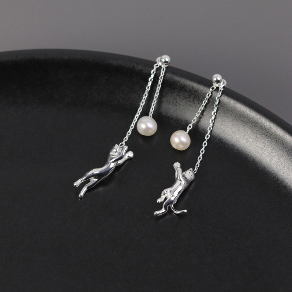 
                      
                        Dangle-Earrings-With-Cat-And-Pearl_4
                      
                    