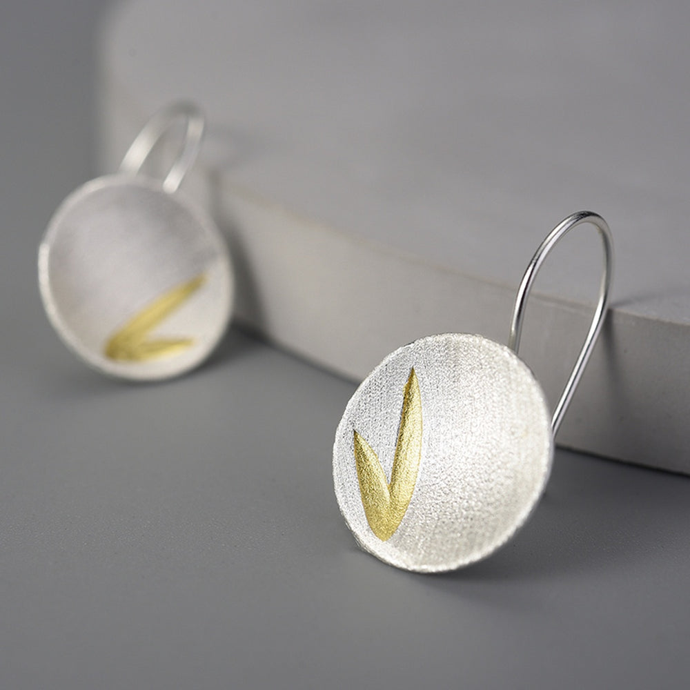 
                  
                    Earrings-With-Bamboo-Leaves-By-Yonandole_4
                  
                