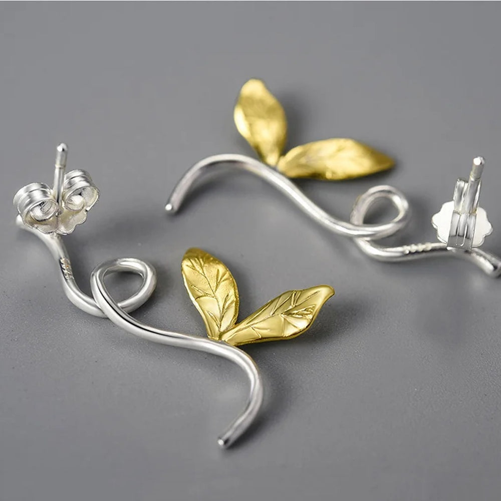 
                      
                        Earrings-With-Branch-And-Engraved-Leaves-By-Yonandole_10
                      
                    