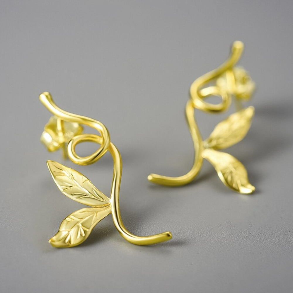 
                      
                        Earrings-With-Branch-And-Engraved-Leaves-By-Yonandole_4
                      
                    