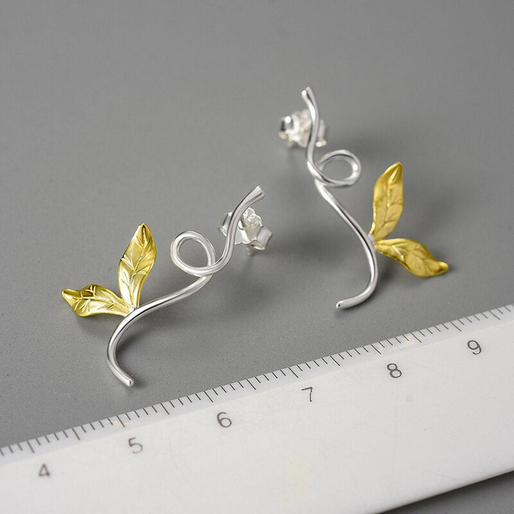 
                      
                        Earrings-With-Branch-And-Engraved-Leaves-By-Yonandole_8
                      
                    