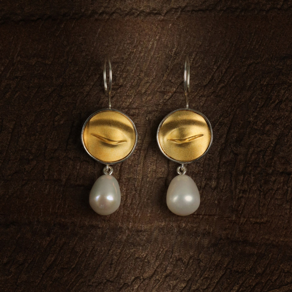 
                  
                    Earrings-With-Buddha-Eyes-And-Freshwater-Pearl-By-Yonandole_11
                  
                