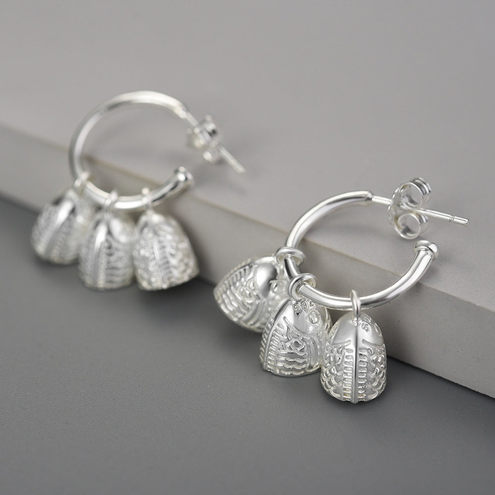 
                      
                        Earrings-With-Engraved-Bells-By-Yonandole_3
                      
                    