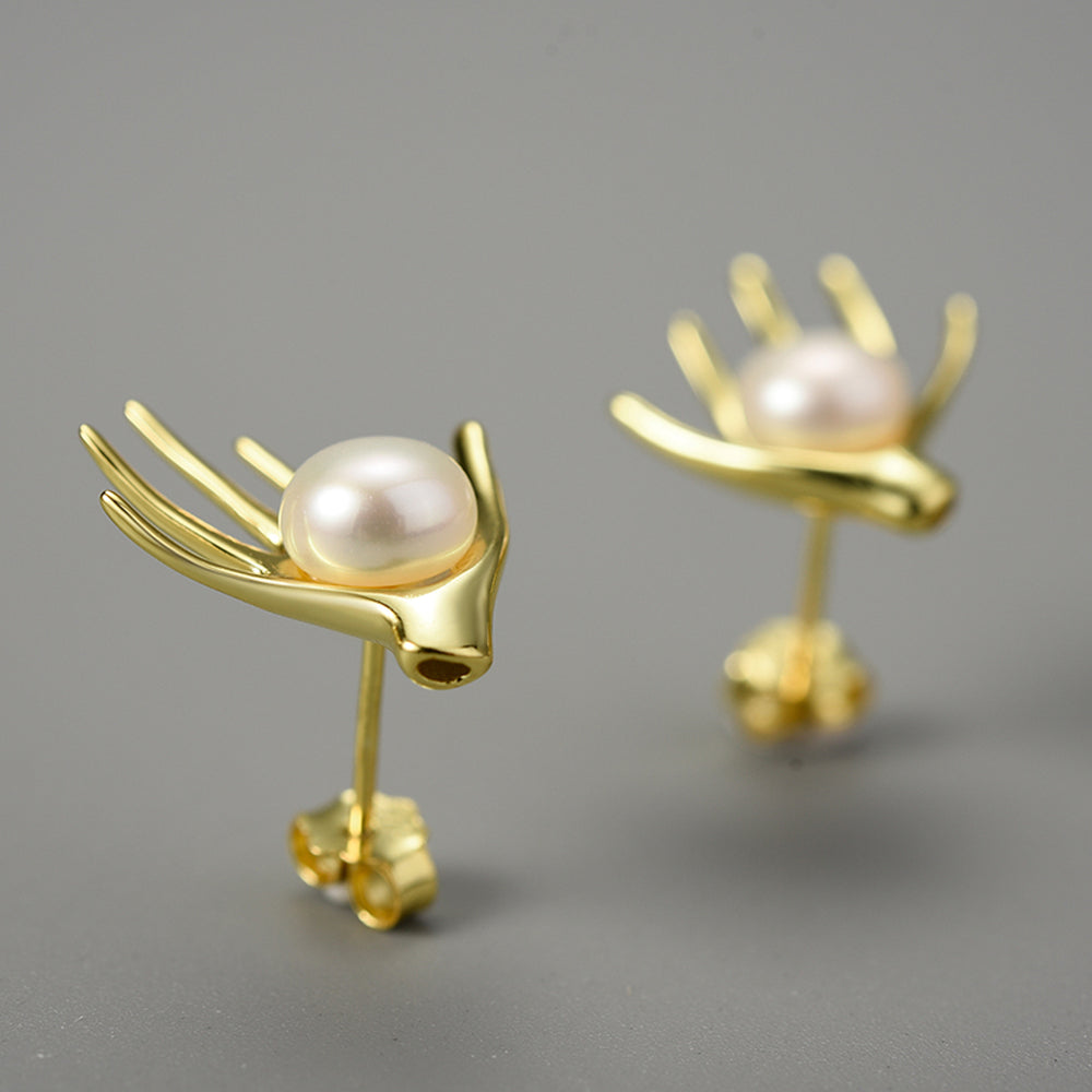 
                  
                    Earrings-With-Hand-And-Freshwater-Pearl-By-Yonandole_5
                  
                