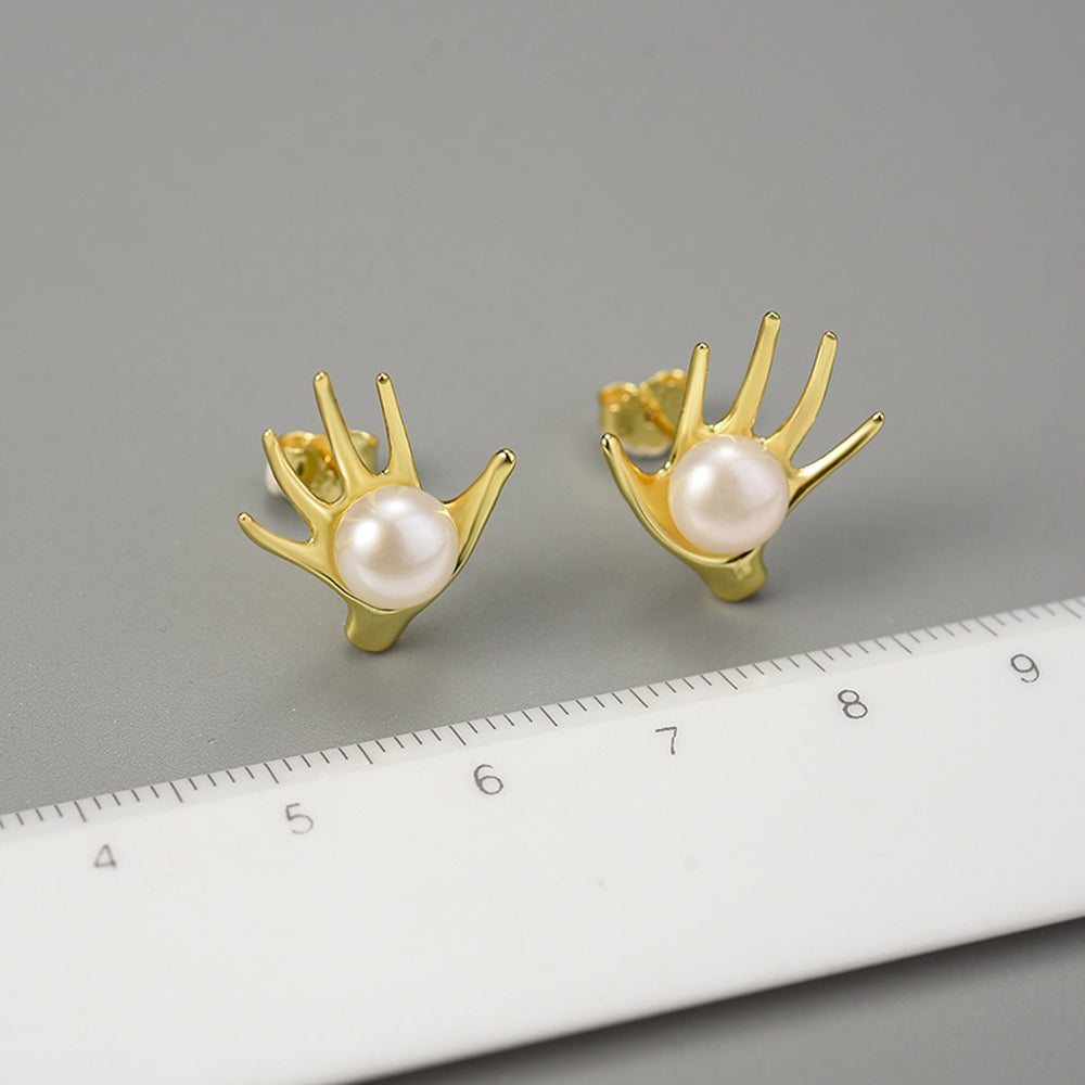 
                  
                    Earrings-With-Hand-And-Freshwater-Pearl-By-Yonandole_6
                  
                