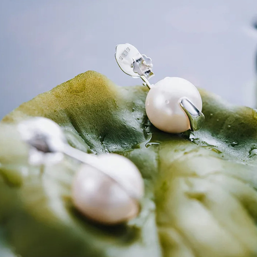 
                  
                    Earrings-With-Lotus-Bud-And-Shell-Pearl-By-Yonandole_10
                  
                