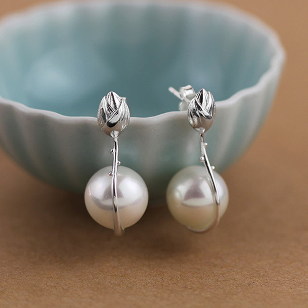 
                  
                    Earrings-With-Lotus-Bud-And-Shell-Pearl-By-Yonandole_3
                  
                