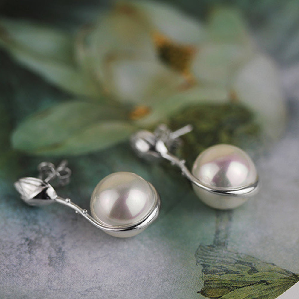 
                  
                    Earrings-With-Lotus-Bud-And-Shell-Pearl-By-Yonandole_6
                  
                