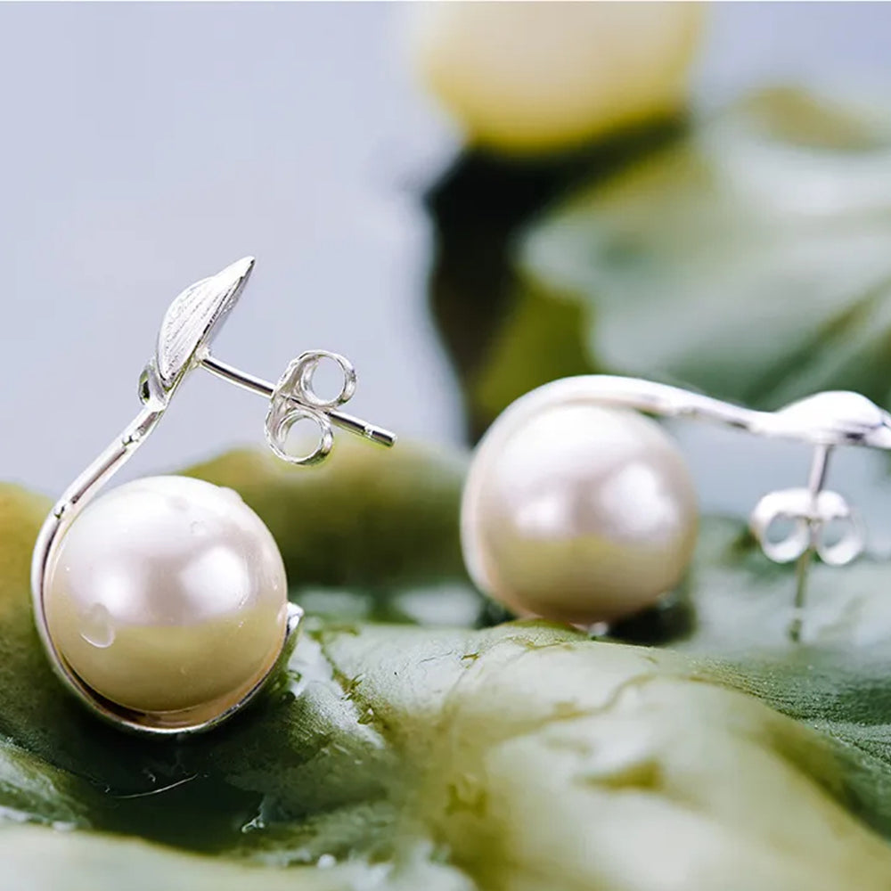 
                  
                    Earrings-With-Lotus-Bud-And-Shell-Pearl-By-Yonandole_9
                  
                