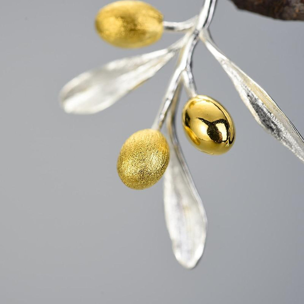 
                  
                    Earrings-With-Olive-Branch-By-Yonandole_5
                  
                