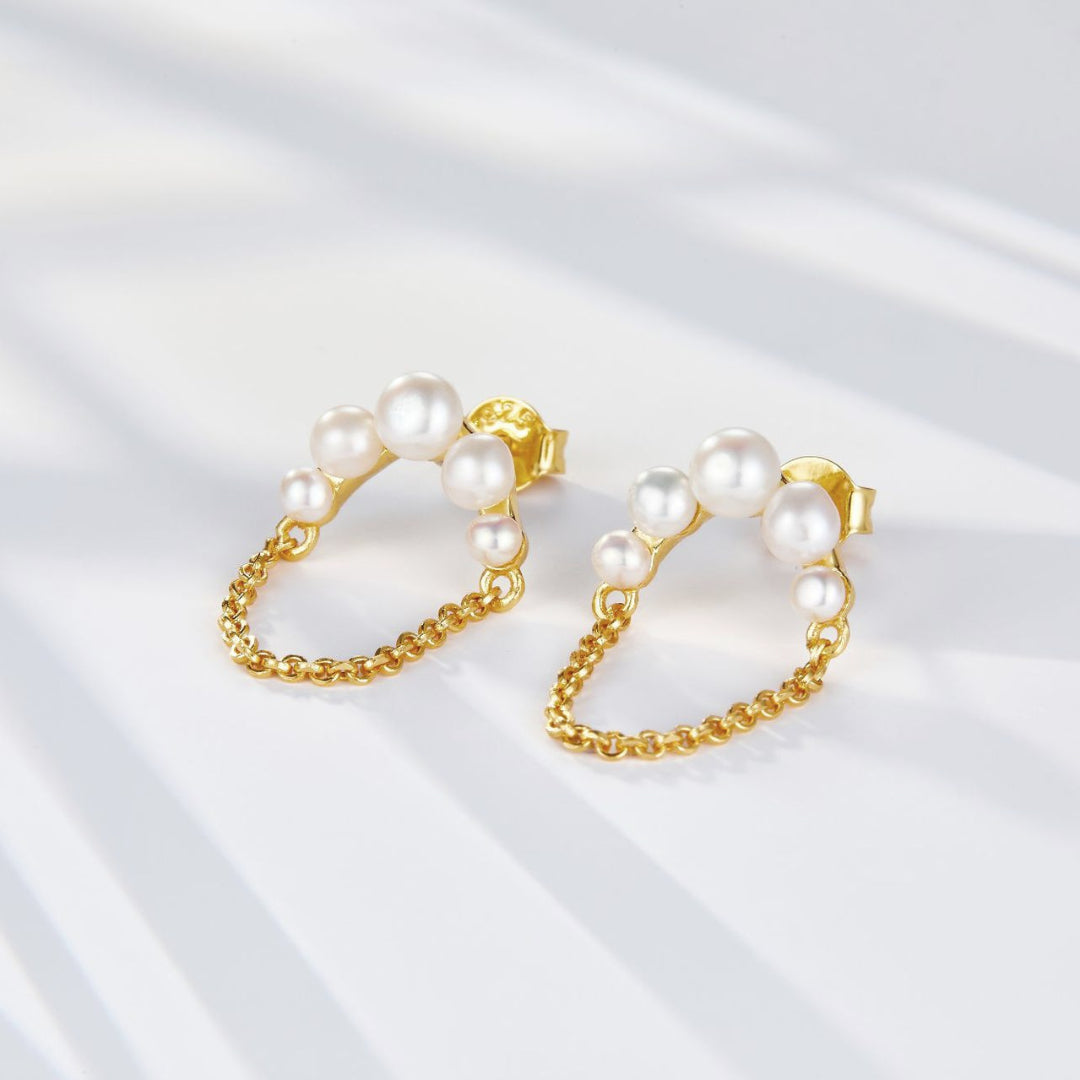 Earrings-With-Pearl-Bow-And-Chain-Tassel-By-Yonandole_2