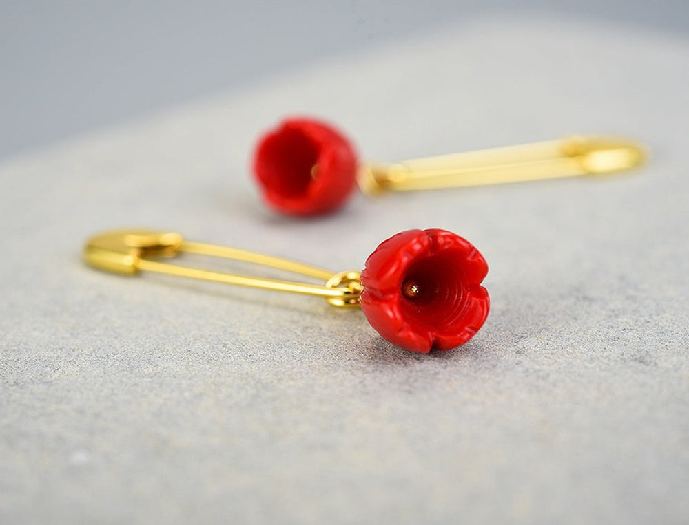 
                  
                    Earrings-With-Safety-Pin-And-Red-Blossom-By-Yonandole_8a
                  
                