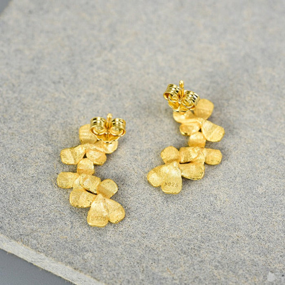 
                  
                    Earrings-With-Small-Four-Petal-Flowers-By-Yonandole_4
                  
                