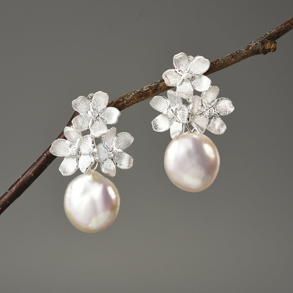 
                  
                    Forget-Me-Not-Earrings-With-Baroque-Pearl-By-Yonandole_2
                  
                