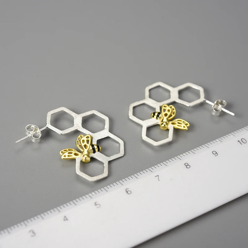 
                  
                    Honeycomb-Earrings-With-Bee-By-Yonandole_5b
                  
                