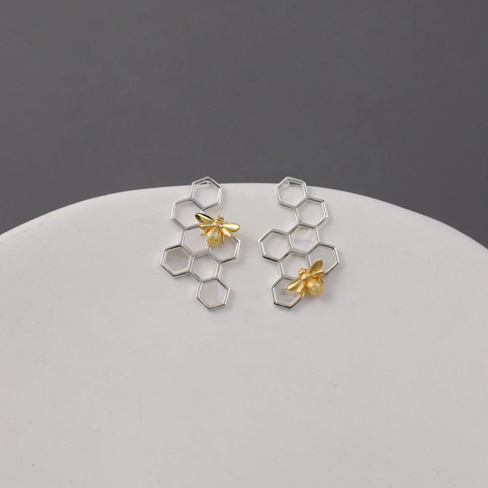 
                      
                        Honeycomb-Earrings-With-Bee-By-Yonandole_8a
                      
                    