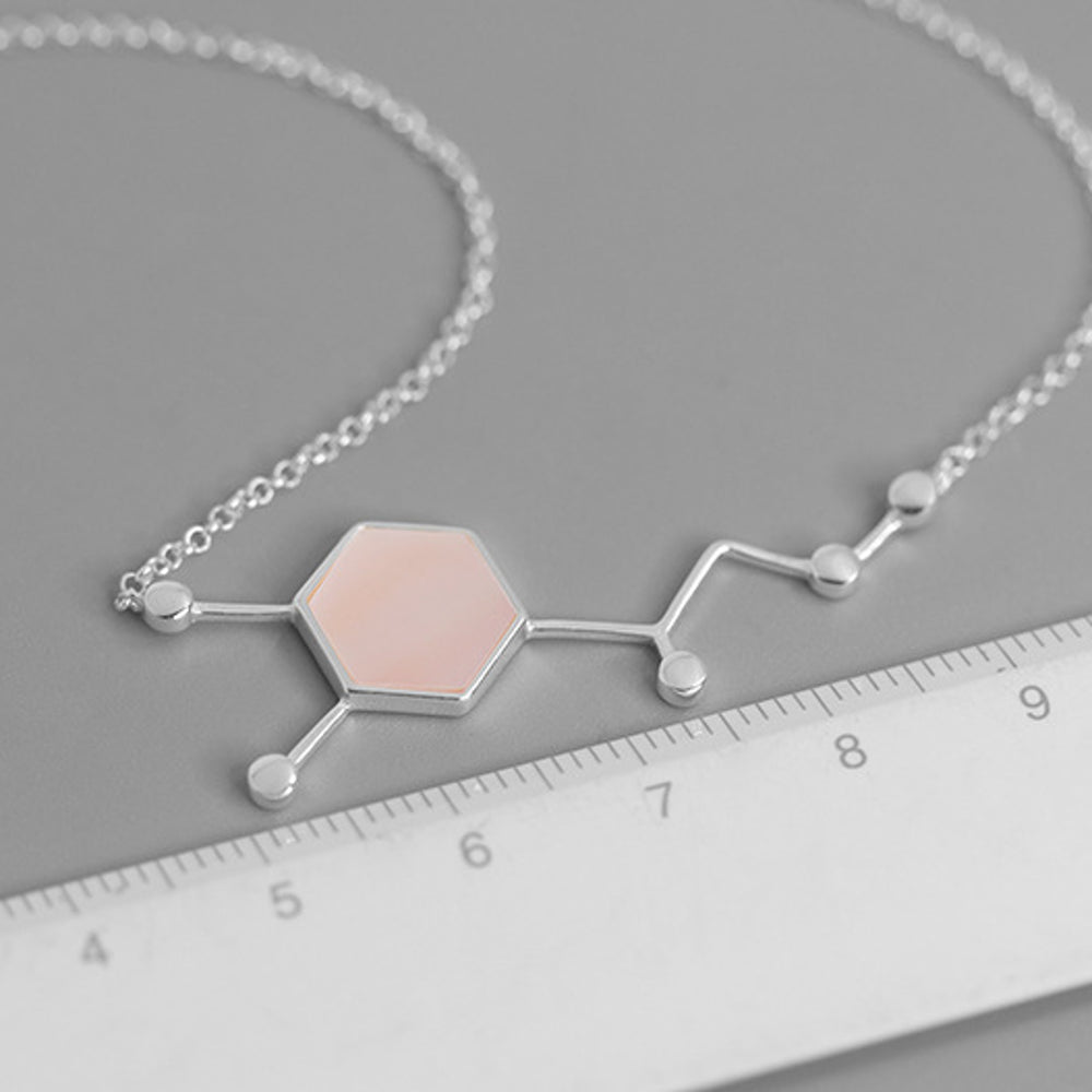 
                      
                        Molecule-Necklace-With-Shell-By-Yonandole_10
                      
                    