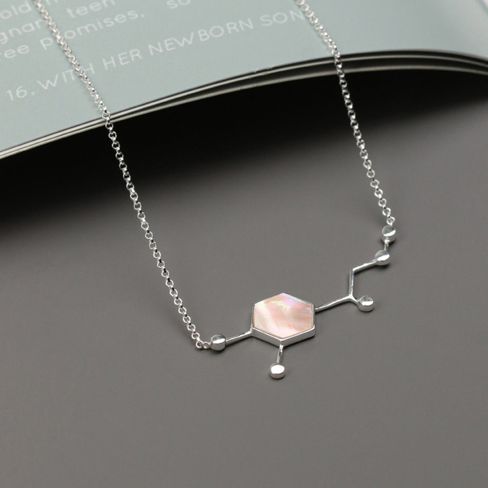 
                      
                        Molecule-Necklace-With-Shell-By-Yonandole_2
                      
                    