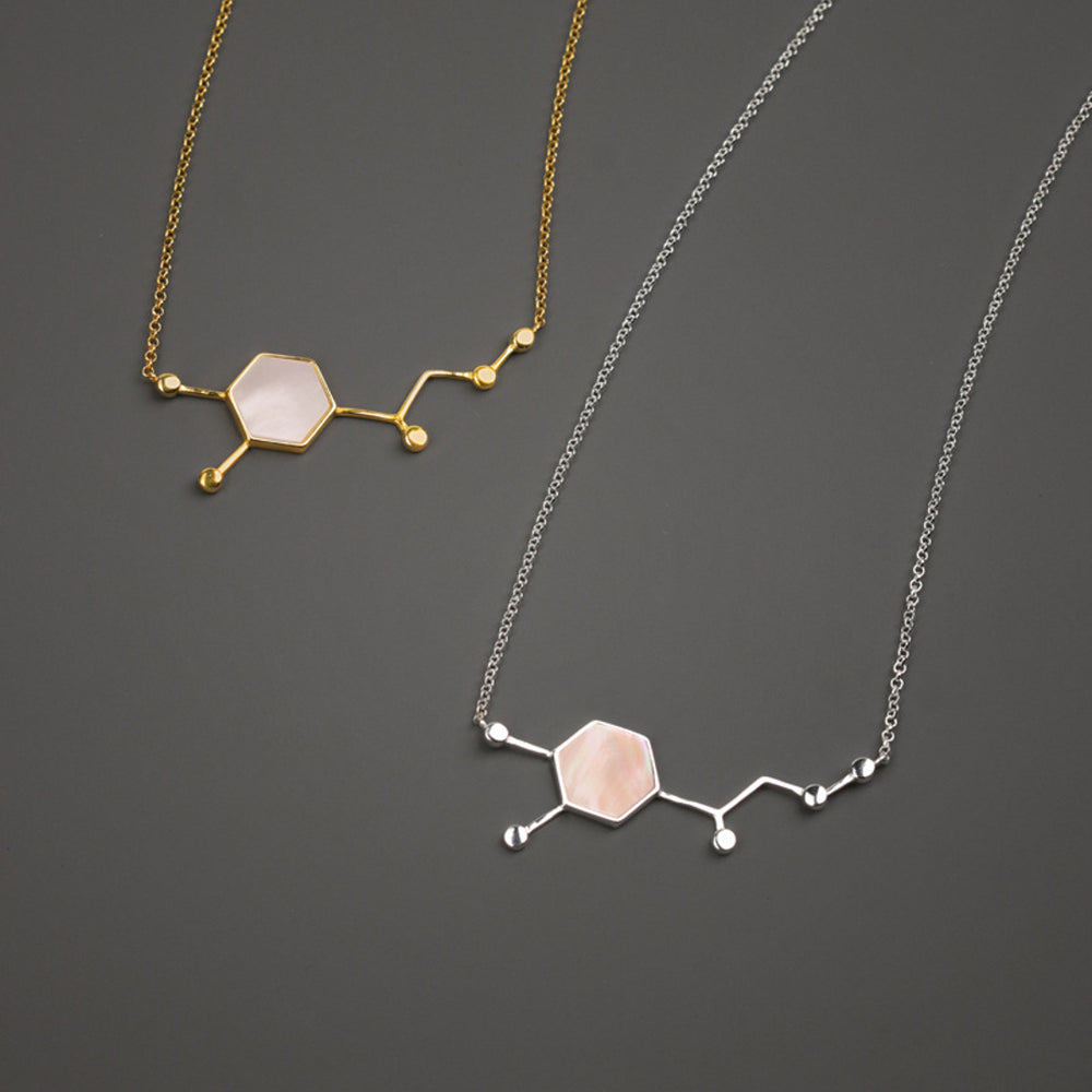 
                      
                        Molecule-Necklace-With-Shell-By-Yonandole_5
                      
                    