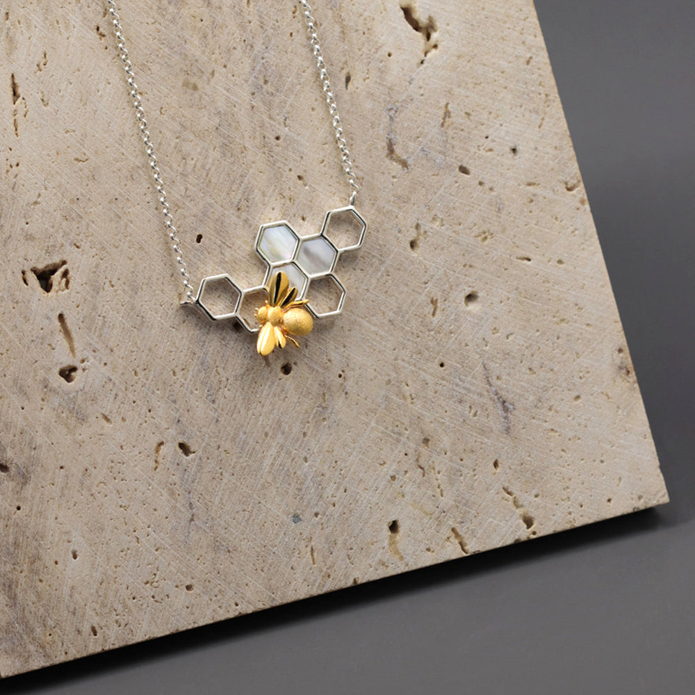 
                  
                    Necklace-With-Honeycomb-And-Bee-Pendant-By-Yonandole_6
                  
                