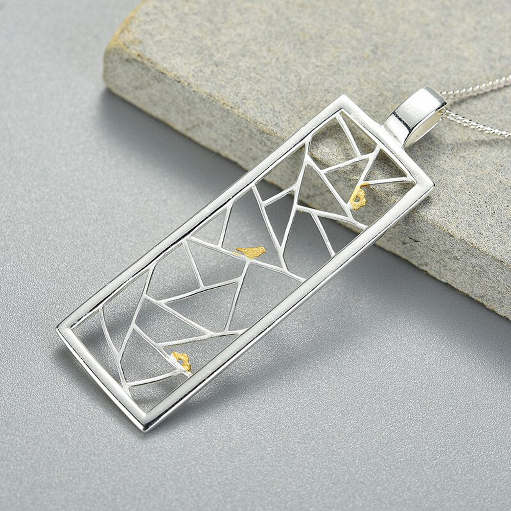 Pendant-With-A-Grid-And-A-Small-Bird-By-Yonandole_2