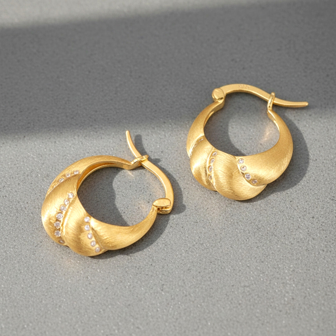 Petal-Shaped-Pouch-Hoops-With-Zirconia-By-Yonandole_2 