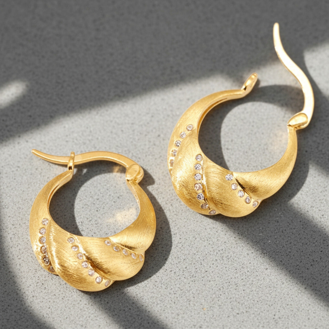 Petal-Shaped-Pouch-Hoops-With-Zirconia-By-Yonandole_3